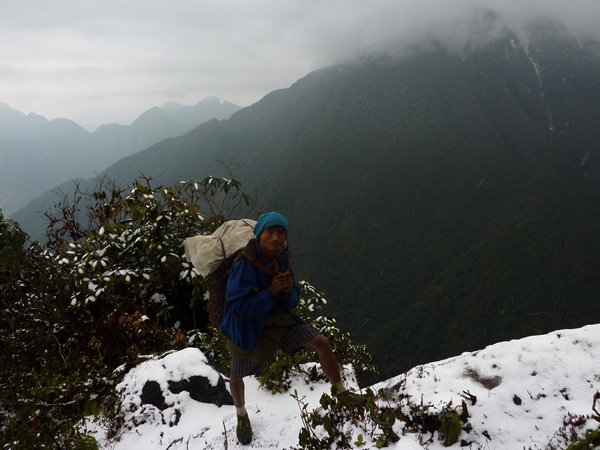 A Rawan people trail guide and porter on the mountain ridge